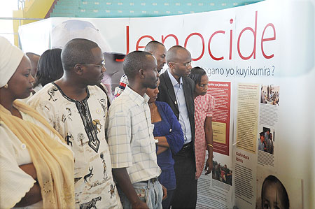 People tour a Genocide exhibition at Petit Stadium during this yearu2019s commemoration week. (Photo J Mbanda)