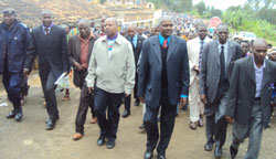 Education Minister Dr Charles Murigande leads residents of Nyange Parish in a Walk to Remember yesterday (Photo S Nkurunziza).