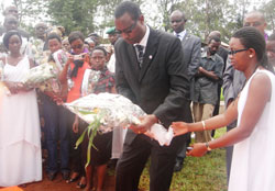 Minister Protais Mitali lays a wreath at Nyarubuye genocide cemetery (Photo. S. Rwembeho).