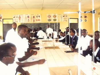 Students of Nyamata High School prepare for practical science. (Photo/ Steven Rwembeho)