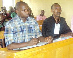 Former Mayor of Rutsiro,  Jean Ndimubahire and his attoney in court (photo S Nkurunziza)