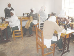 Some of the members undergoing tailoring training at the centre. Photo G .Mugoya