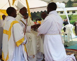 Nyundo Diocese Monsignor Alex Habiyambere ordains priest Jean Paul Hagumaneza yesterday (Photo S. Nkurunziza)