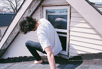 A teenager trying to pass through a window. Net photo