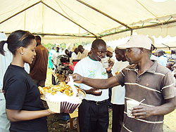 Residents enjoy the taste of Rwanda coffee served by Bourbon Coffee centre at the event. The New Times. D.Sabiiti