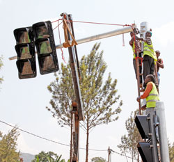  The new modern traffic lights being set up. The Sunday Times/ Timothy Kisambira