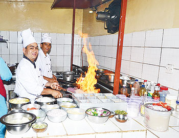 ChefsCooks at Zaaffran restaurant preparing indian dishes .Courtesy / photo