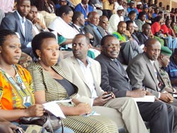 Minister Francios Kanimba (3rd R) enjoys a dance troop show at the expo. The Sunday Times / Danniel Sabiiti