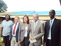 German Health Minister, Malu Dreyer (c), poses for a group photo with German mayors and local district leaders. The Sunday Times/ Daniel Sabiiti