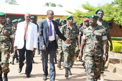 Military Hospital Director Dr Ben Karenzi (L) shows Defence Minister James Kabarebe and other officers around the facility earlier this year. The New Times / File.