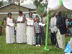 The cooperativeu2019s leadership committe displaying certificates of recognition during the ceremony. The New Times / Dan Ngabonziza.