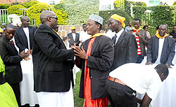 Ugandau2019s High Commissioner to Rwanda, Amb. Richard Kabonero (L), greets the delegation at his residence in Nyarutarama yesterday.The Sunday Times / J. Mbanda