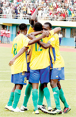 Amavubi players celebrate after scoring against Eritrea in the second leg of the 2014 Fifa World Cup qualifier. The New Times / File