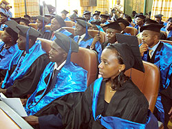 Some of the graduands follow on a screen the graduation ceremonies that were coordinated by use of V-SAT technology. The Sunday Times / G. Mugoya