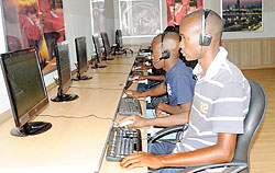  The new network software will help cut costs at such facilities as Internet Cafes. The New Times / File