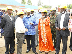 PM Pierre Damien Habumuremyi (C), accompanied by senior government officials, during a visit to  SteelRwa Industries. The New Times / S. Rwembeho.