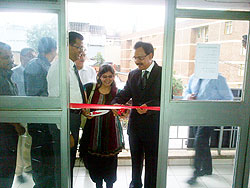 Soulmen Ray, (R) the India High Commissioner to Rwanda opening India bureau of consular affairs in Kigali as Danesh Kalyan, (L) the chairman of India Association of Rwanda looks on. The Sunday Times / Courtesy