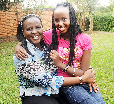 Nancy Mutoni with her mother, Serafina Sifa, at their home in Kacyiru, yesterday. The Sunday Times / J. Mbanda.