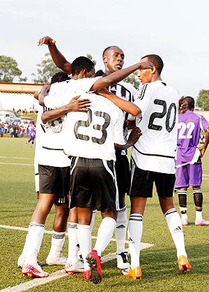 APR players  celebrate after scoring against La Jeunesse in a Primus League match last weekend. The New Times / T. Kisambira