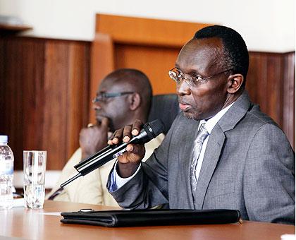 Samuel Rugege the supreme chief Justice together with Johnstone Busingye president of the high court, during the news conference yesterday. The New Times / T.  Kisambira.