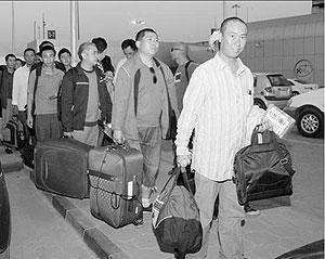 34 freed Chinese workers arrived safe in Khartoum after their camp  was attacked by rebels. Photo / Xinhua