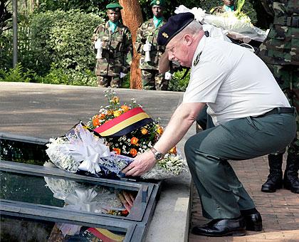 The visiting Belgian army chief of defence, Gen. Charles-Henri Delcour, lays a wreath in respect of the 1994 Genocide Victims. The New Times / Timothy Kisambira.