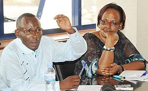 Dr. Nason Munyandamutsa (L) a psychiatric and Yvonne Kayiteshonga, Director of the Psychosocial Consultation Centre at the press conference. The New Times /  J.  Mbanda.