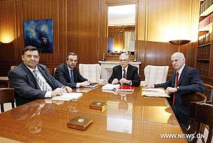 Greek PM Lucas Papademos (2nd R), former Premier George Papandreou (1st R), conservative New Democracy President Antonis Samaras (2nd L) rightist Popular Orthodox Rally head George Karatzaferis (1st L