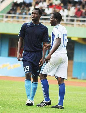 Laudit Mavugo (13) standing next to Rayon Sport's defender Iddy Nshimiyimana downed APR in a PNFL encounter yesterday at Amahoro stadium. The New Times / T. Kisambira