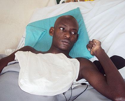 Spinal cord patient Egide Ntihabose at Nyanza Hospital. The New Times / JP.  Bucyensenge