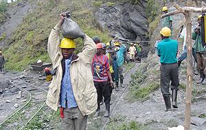 Miners at Gifurwe Wolfram Company in Burera District. The New Times / File.