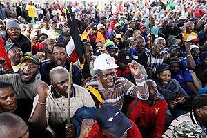 Striking workers take part in a march at Emalahleni, 100km (60 miles) east of Johannesburg in 2011. Net photo