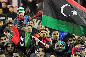 Libyans celebrate on Thursday night in Tripoli, the seat of the interim government. Net Photo.