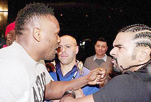 Dereck Chisora threatens to shoot and burn David Haye after a clash following Chisora's loss to Vitali Klitschko in Munich. Net photo.