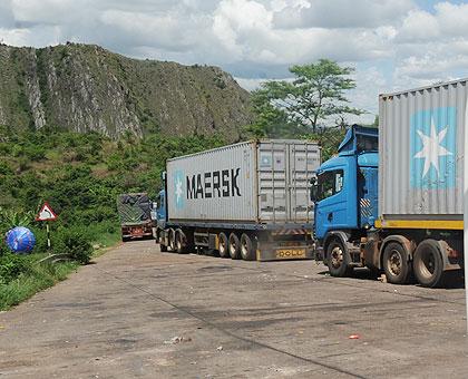  Transit goods trucks heading towards  the Rwandan border at Rusumo from Tanzania. The New Times File.