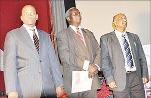 First counselor in Uganda Dan Mutezintare (L), the Universityu2019s VC Prof Eric Edroma (C) and Chairman Dr. Silim Nahdy during the awarding ceremony yesterday.  The New Times / Gashegu Muramira.