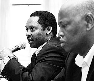 RGB's Prof Anastase Shyaka  (L) and Alphonse Nkusi at the meeting.  The New Times / Timothy Kisambira