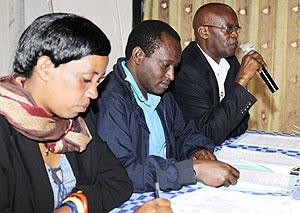 (R-L) Dr Laurien Nyabienda, Executive Director, Emmanuel Shamakokera, and Gorette Umbereyimfura  at the meeting before it was dispersed yesterday. The New Times / Timothy Kisambira