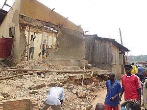 The first house to be demolished following the directive. It was pulled down on Sunday afternoon.  The New Times / G. Mugoya