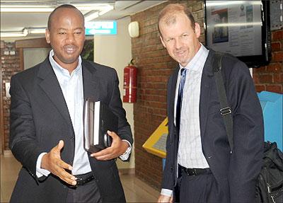 Infrastructure Minister Albert Nsengiyumva and World Bank Country Director, Johannes Zutt, after the latter's meeting with the Prime Minister yesterday. The New Times / John Mbanda.