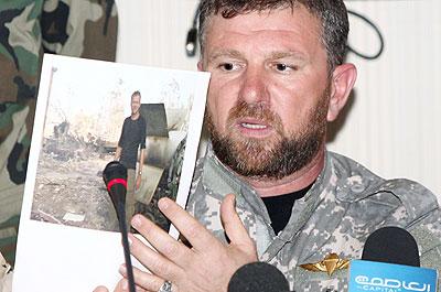 Faraj Swehli, commander of Swehli militia, said his men found official documents with the journalists. Net photo