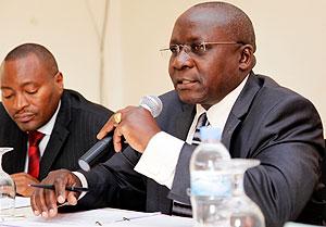 Col Alex K. Angogo (R) chairing the meeting,  together with  Lt Col.Joseph K. Mburu, Defence Liaison Officer from Kenya, during the meeting. The New Times / Timothy Kisambira