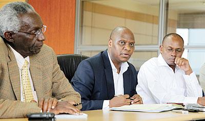 NEC chairman Prof Chrsologue Karangwa president of NEC,(L) the Executive Secretary Charles Munyaneza  and commissioners Oswald Burasanzwe  and Juvens Musefano commissioners, during the press conference. The New Times / T. Kisambira 