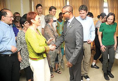 State Minister for Primary and Secondary Education Mathias Harebamungu meets the Norwegian teachers.  The New Times / John Mbanda.