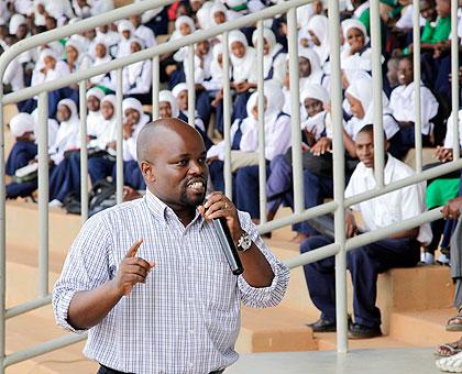 The Minister for Youth, Jean Philbert Nsengimana, speaking to youths at Nyamirambo Stadium.  The New Times Timothy Kisambira