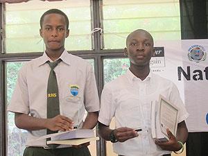 Isaac Manzi from Riviera High School ( L)and Emmanuel Mwemezi Safina from Petit Su00e9minaire de Nyundo Saint Pie X emerged winners in the National Public Speaking Competition grand finale