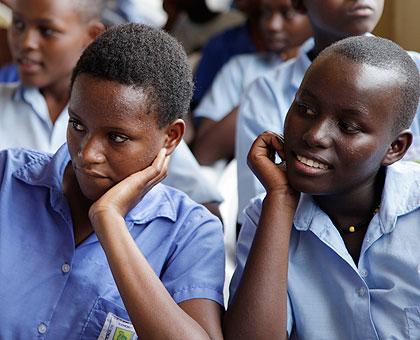 School girls  listening to a speech during the event. They have been cautioned against 'cheap gifts'. The New Times / Courtesy.