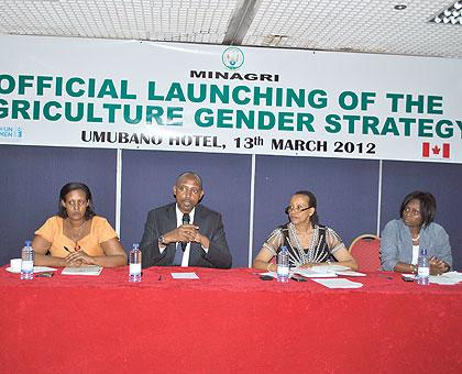 Chief Gender Monitor, Odda Gasinzigwa (L), and the Agriculture Ministry PS, Ernest Ruzindaza, at the meeting.  The New Times / Courtesy.