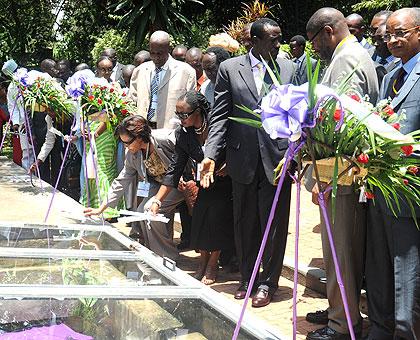 Delegates at the conference pay tribute to Genocide victims at the Kigali Memorial Centre yesterday. The New Times / John Mbanda.