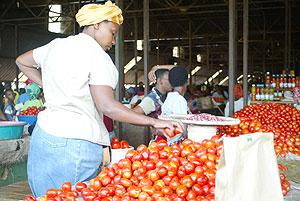 A food vendor in a Kigali market. The New Times / File.